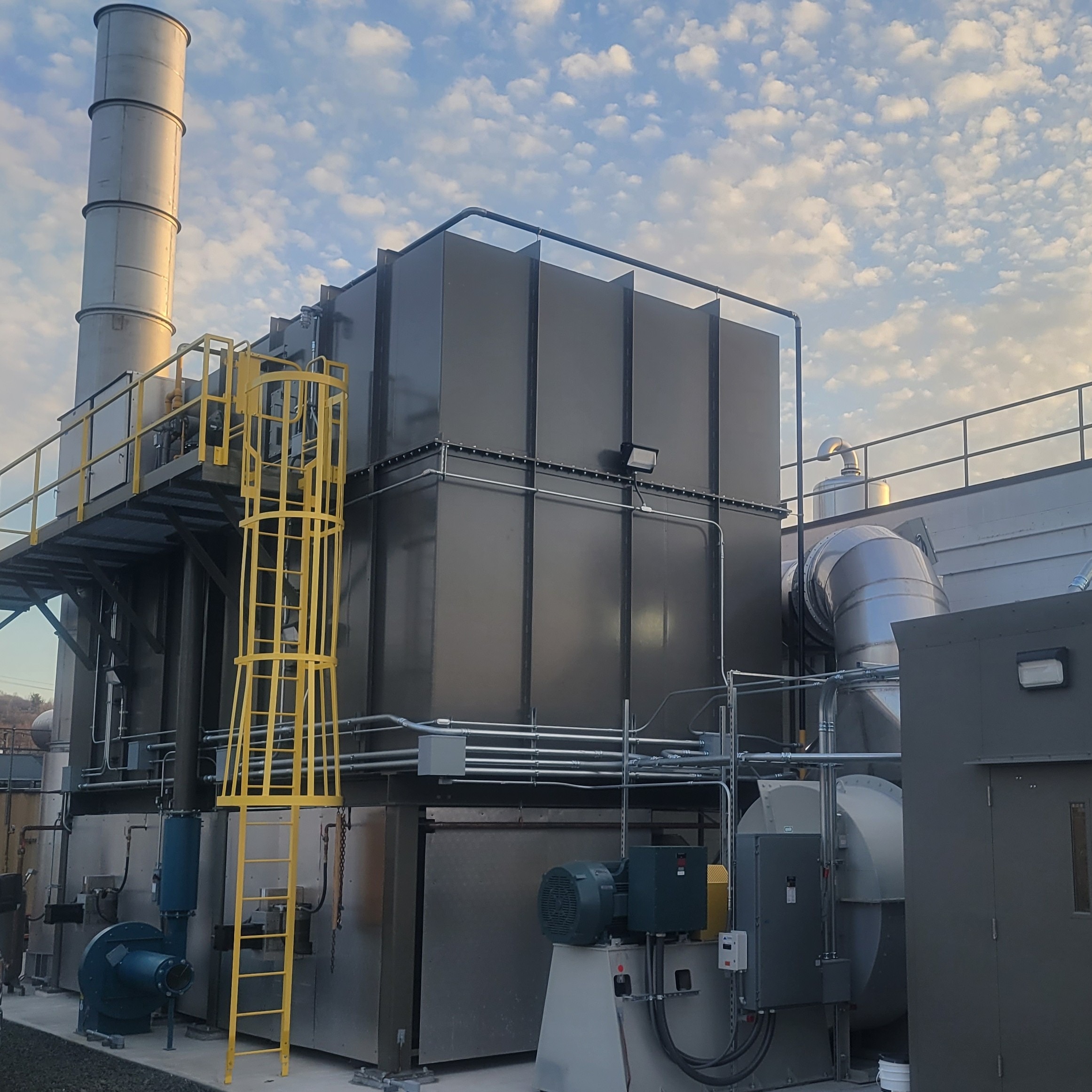 Industrial regenerative thermal oxidizer system installed at manufacturing facility