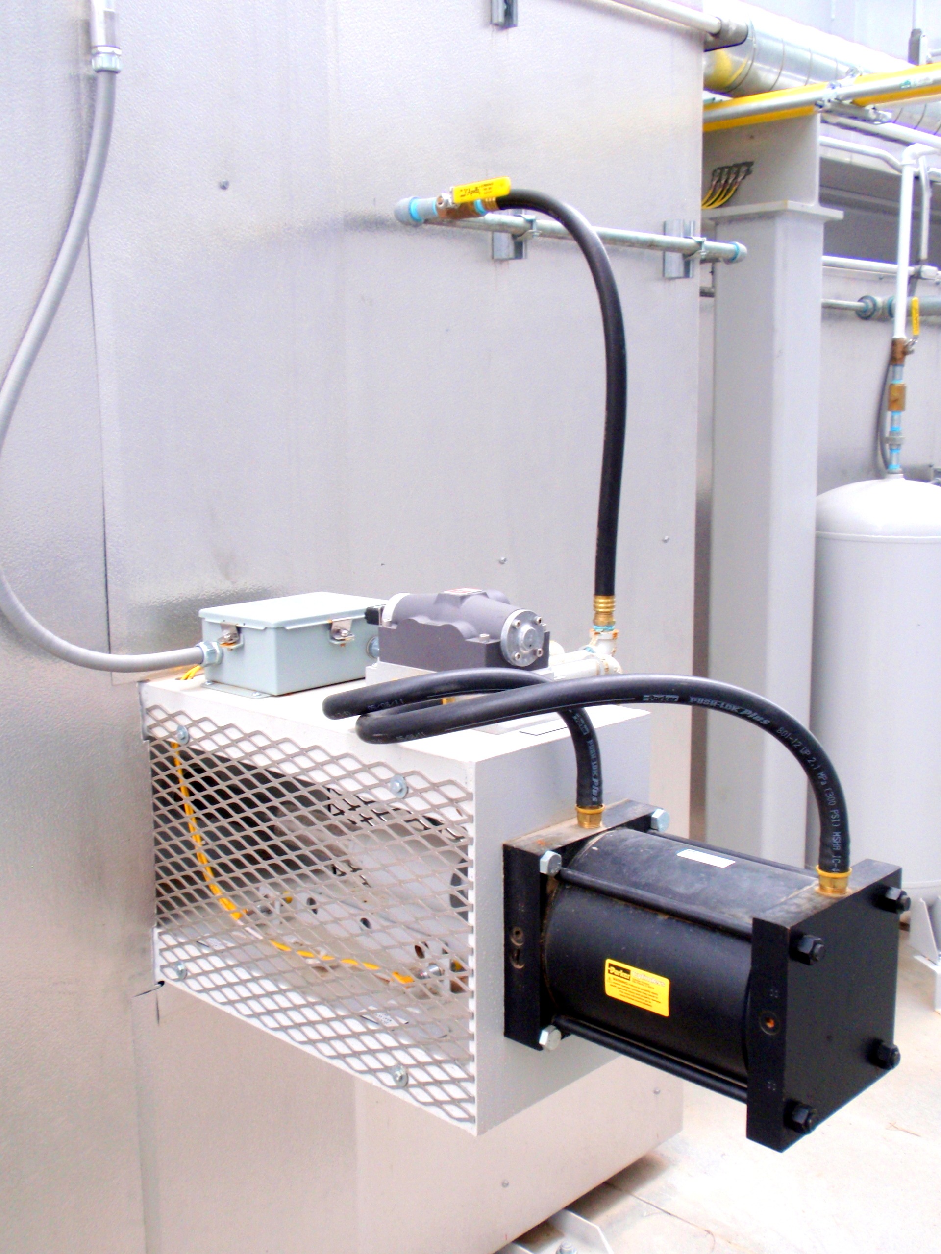 TANN poppet valve controls and piping used to direct airflow in an RTO system